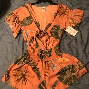 Cute romper, never been worn, tags still attached